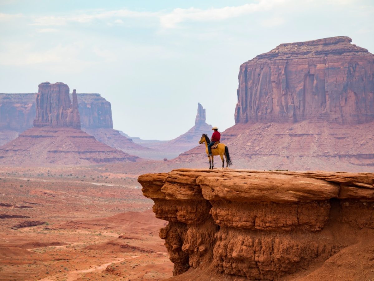Cowboy looking at the horizon, Monument Valley Navajo Tribal Park